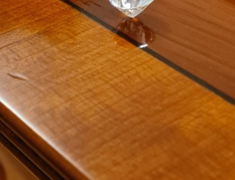 A very old diamond well balanced on a table